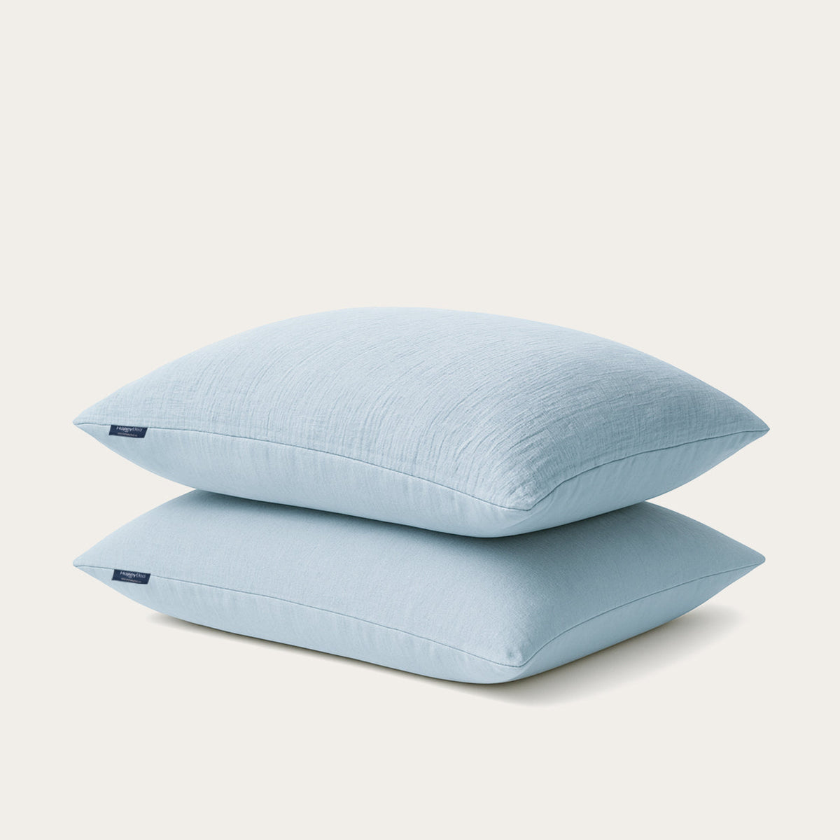 Set van 2 Thehappybed Mousseline kussenslopen in lichtblauw met zachte, lichte microvezel en praktische hotelsluiting voor luxe comfort en stijl.