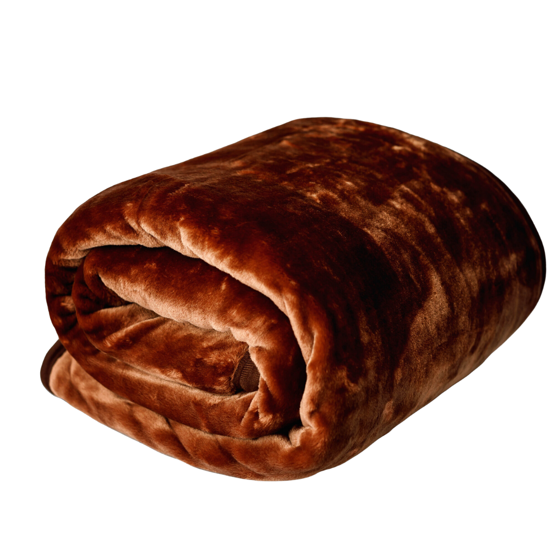 Thehappybed brown cozy fleece blanket 150x200 cm rolled up.